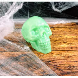 Cráneo fluorescente de plástico 11 cm